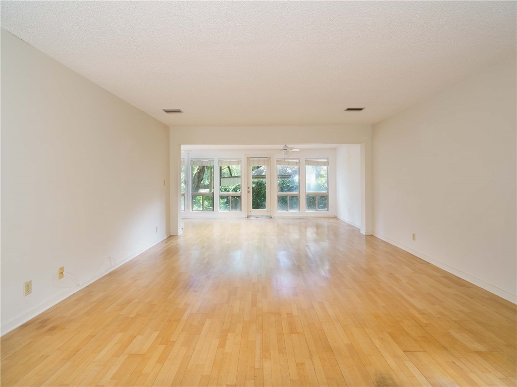 3309 Sea Marsh Road, Unit 3309 Fernandina Beach, FL 32034 - Photo 21 of 34 wooden floor in an empty room