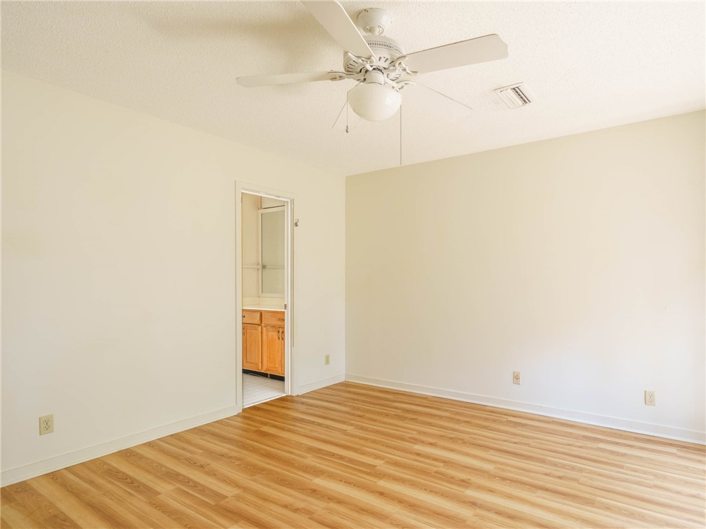 3309 Sea Marsh Road, Unit 3309 Fernandina Beach, FL 32034 - Photo 22 of 34 a view of empty room with wooden floor