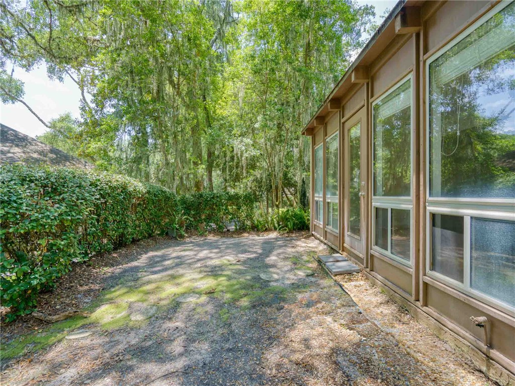 3309 Sea Marsh Road, Unit 3309 Fernandina Beach, FL 32034 - Photo 27 of 34 a view of a backyard with garden