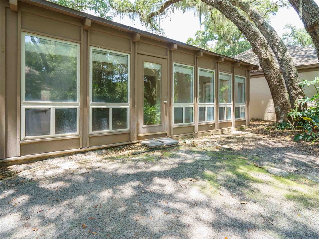 3309 Sea Marsh Road, Unit 3309 Fernandina Beach, FL 32034 - Photo 30 of 34 a view of a house with yard and sitting area