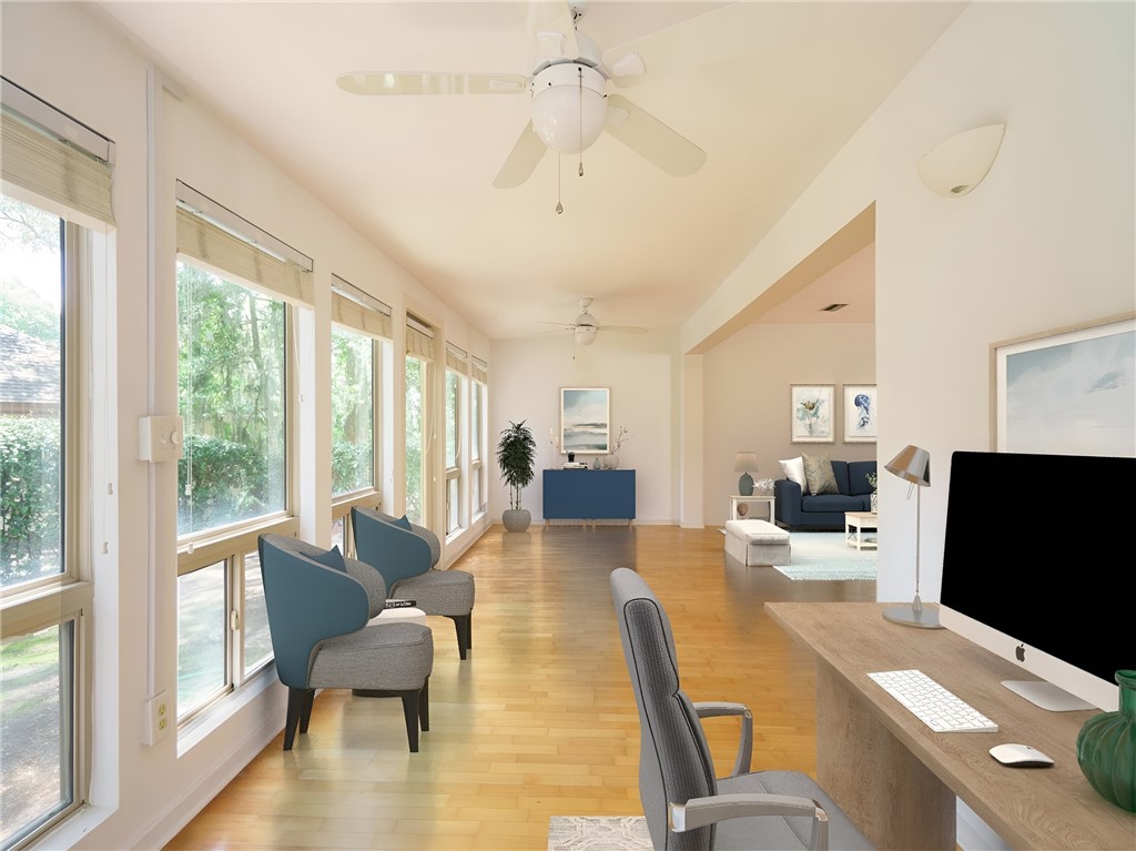 3309 Sea Marsh Road, Unit 3309 Fernandina Beach, FL 32034 - Photo 9 of 34 a view of a dining room with furniture window and outside view