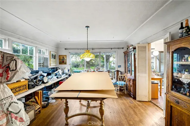 a kitchen with stainless steel appliances granite countertop a refrigerator a stove and a sink