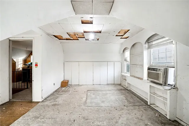 a view of a hallway with an entryway