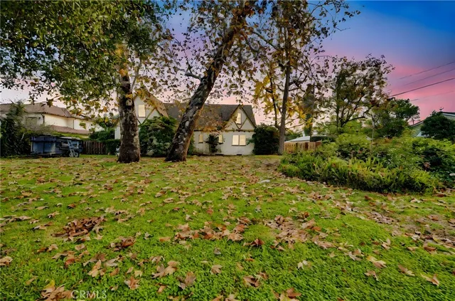 a house with trees in the background