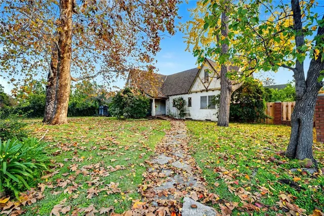 a house view with a garden space