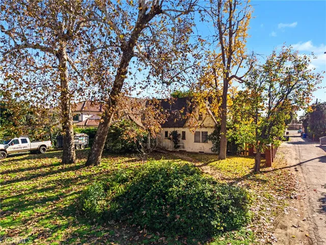 an aerial view of residential houses and city view