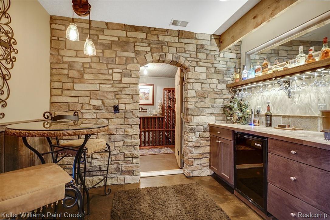 525 Sheldon Court Rochester, MI 48306 - Photo 52 of 66 Enter the Wine Room through Custom Stone Entry