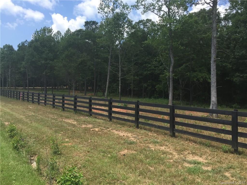 2239 Cedar Road York, SC 29745 - Photo 3 of 3 a view of a yard with wooden fence