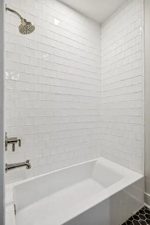 a bathroom with a bathtub