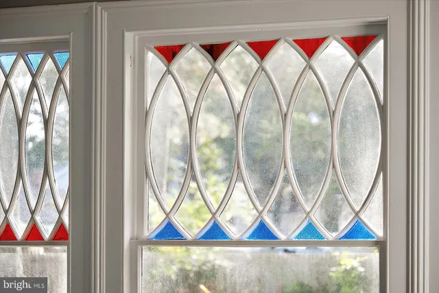 a view of walk in closet with wooden floor