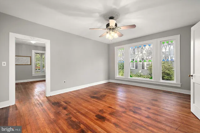 a view of an empty room with a window