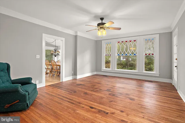 a bathroom with a sink toilet and mirror