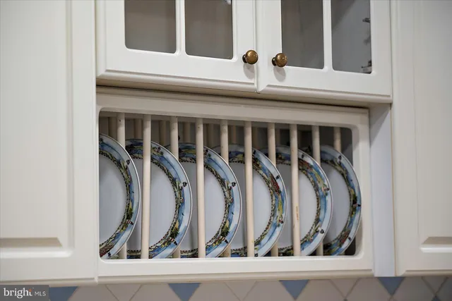 a view of entryway with wooden floor and stairs
