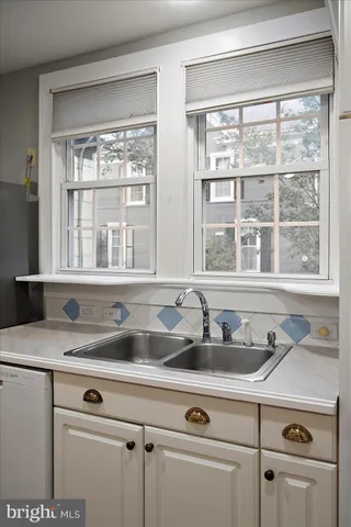 a view of entryway with wooden floor and stairs
