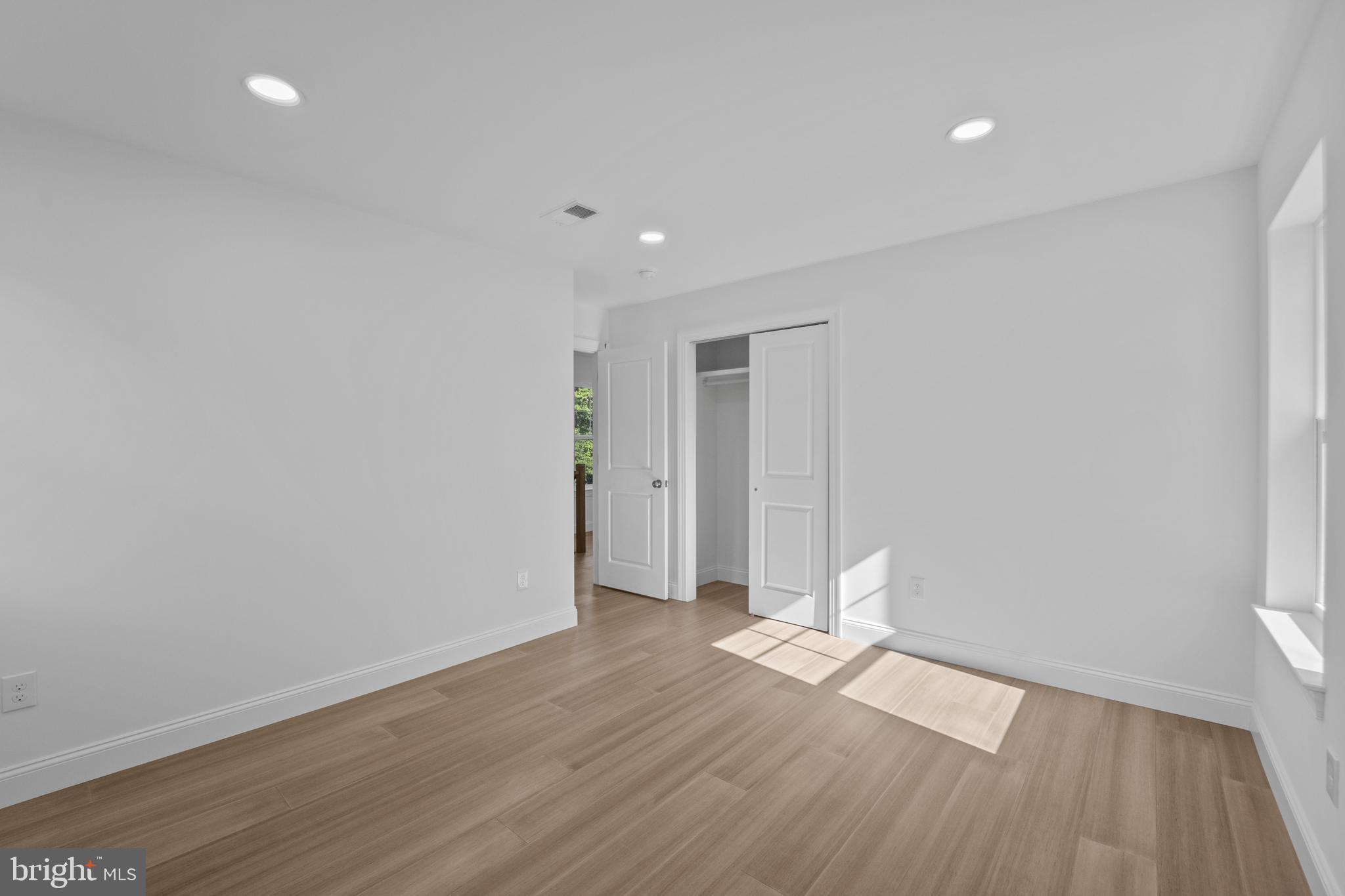 492 Ellis Avenue Lawnside, NJ 08045 - Photo 21 of 33 a view of empty room with wooden floor