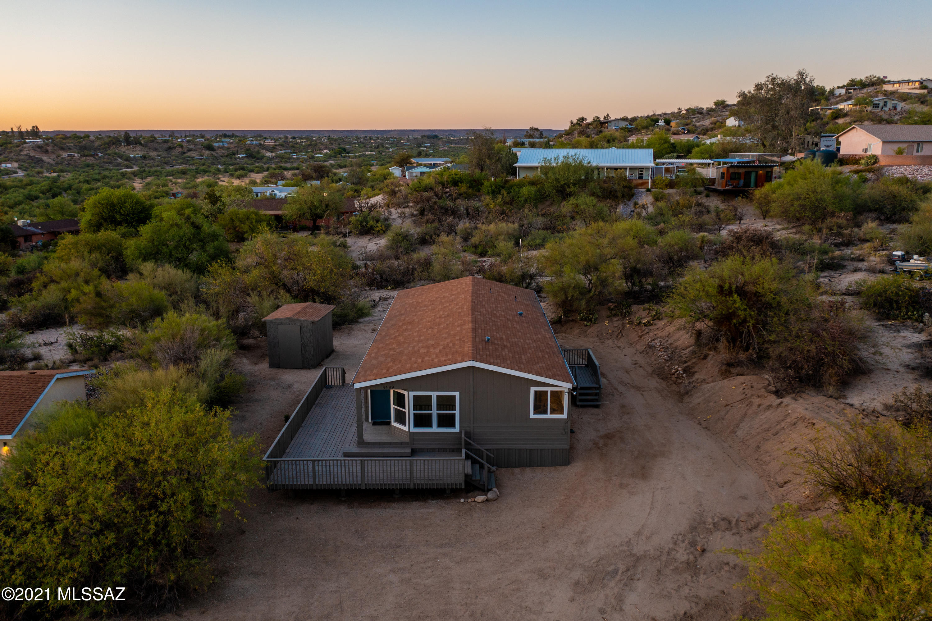 4489 East Wilds Road Tucson, AZ 85739 - Photo 10 of 50 an aerial view of a house with a garden