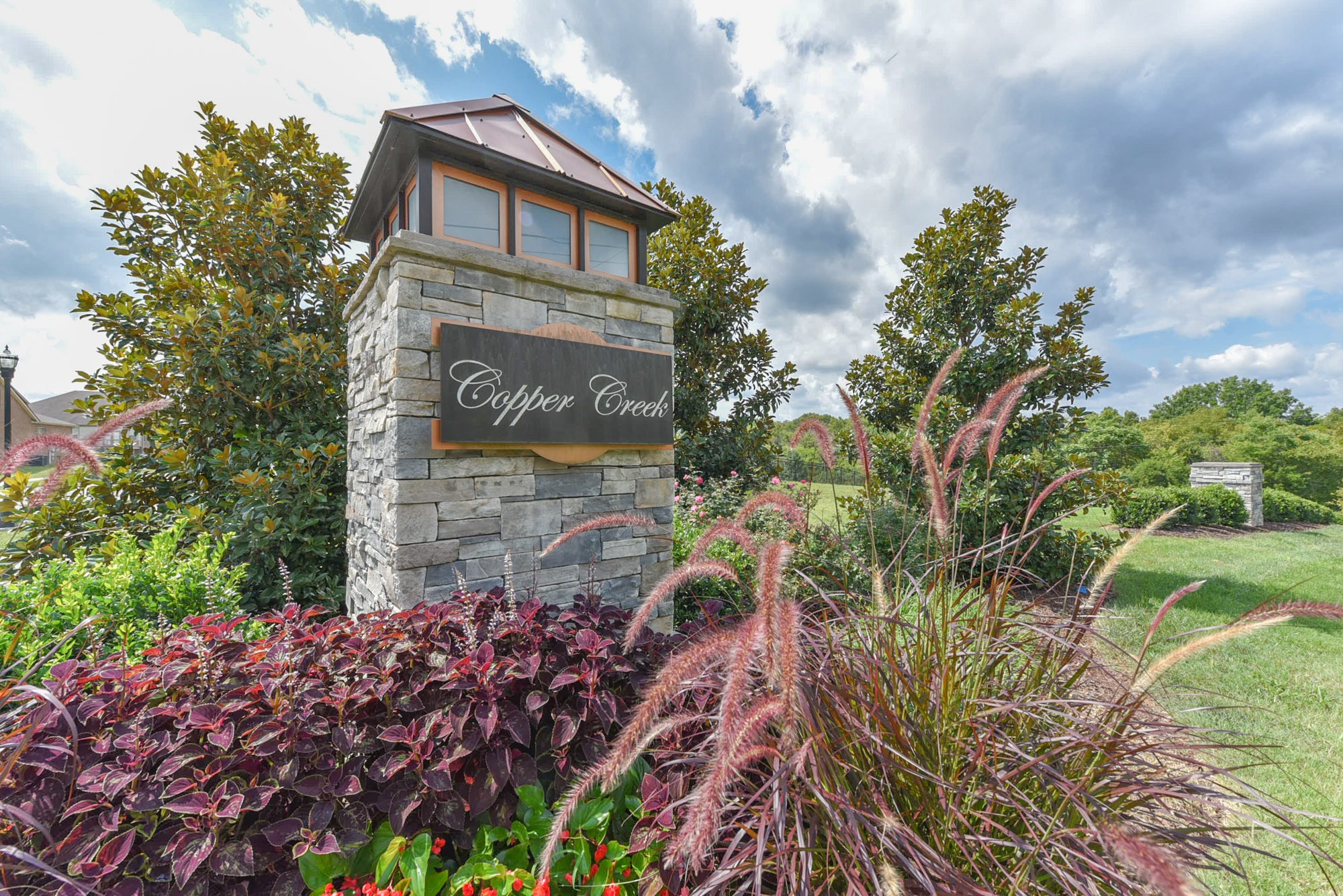 551 Fall Creek Circle Goodlettsville, TN 37072 - Photo 26 of 28 a sign that is on a brick wall