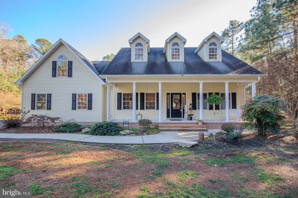 a view of house with outdoor space
