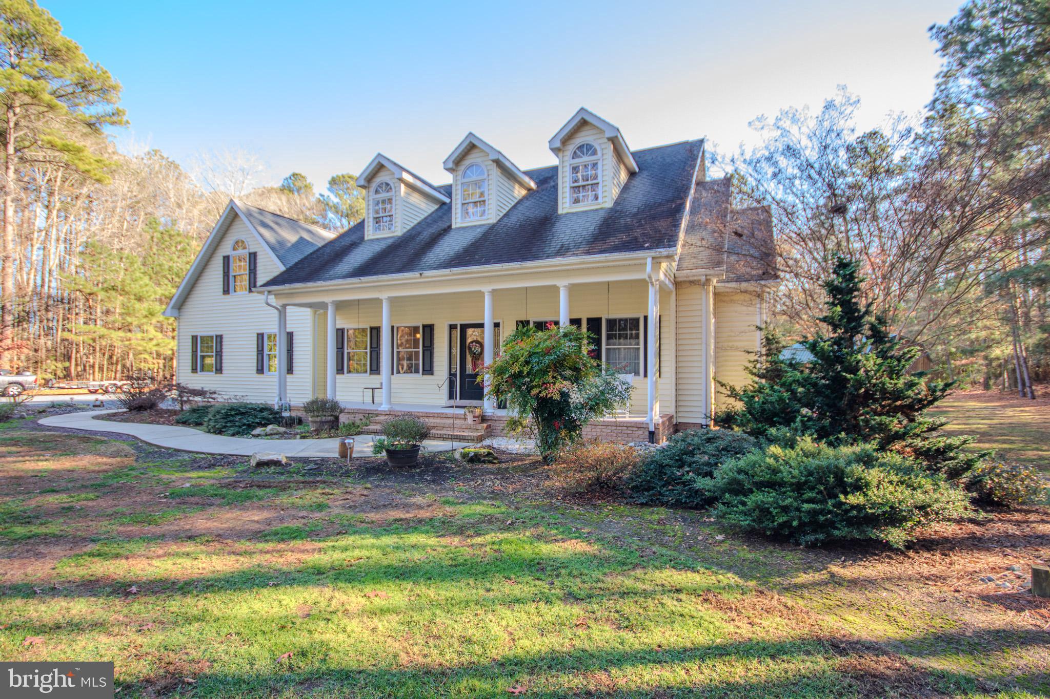 7395 Cherry Walk Road Hebron, MD 21830 - Photo 13 of 61 a view of a house with backyard sitting area and garden