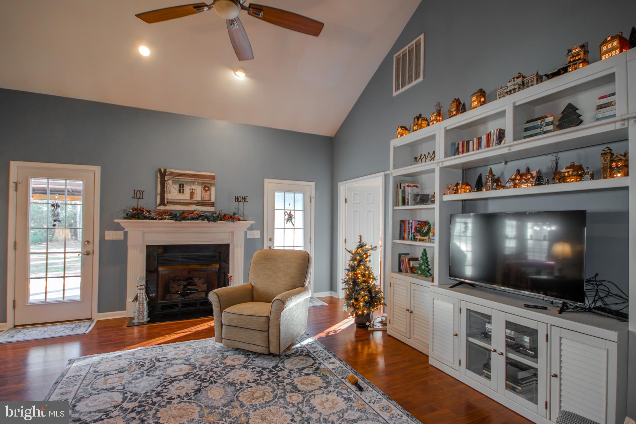 7395 Cherry Walk Road Hebron, MD 21830 - Photo 15 of 61 a living room with furniture and a flat screen tv
