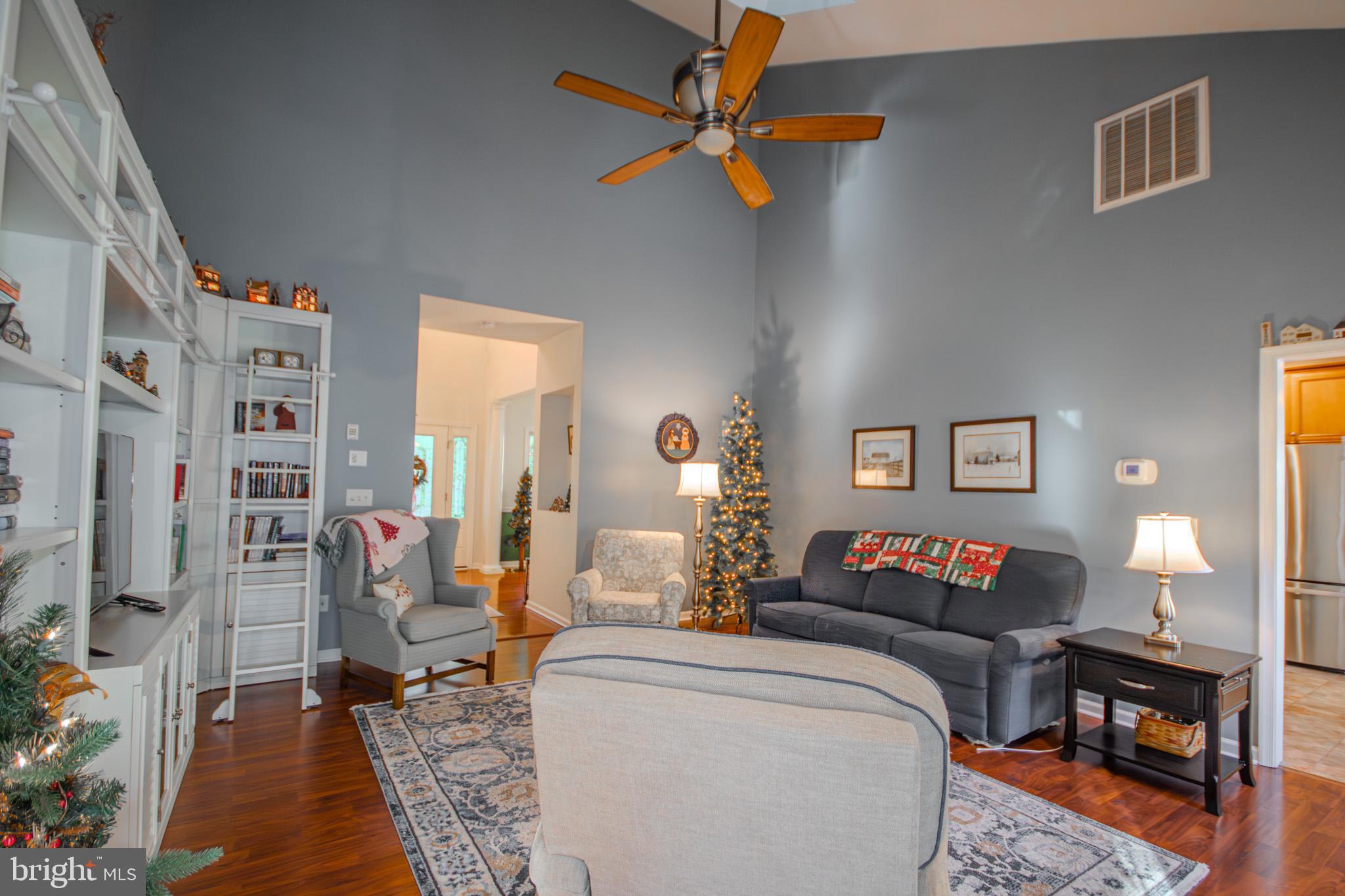 7395 Cherry Walk Road Hebron, MD 21830 - Photo 16 of 61 a living room with furniture and a table