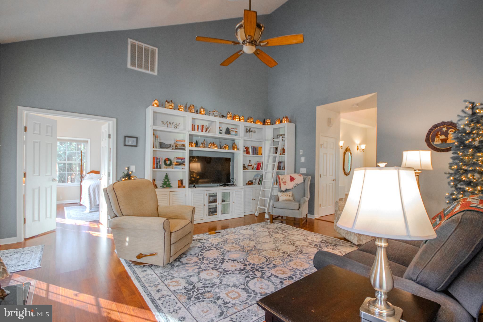 7395 Cherry Walk Road Hebron, MD 21830 - Photo 17 of 61 a living room with furniture and a flat screen tv