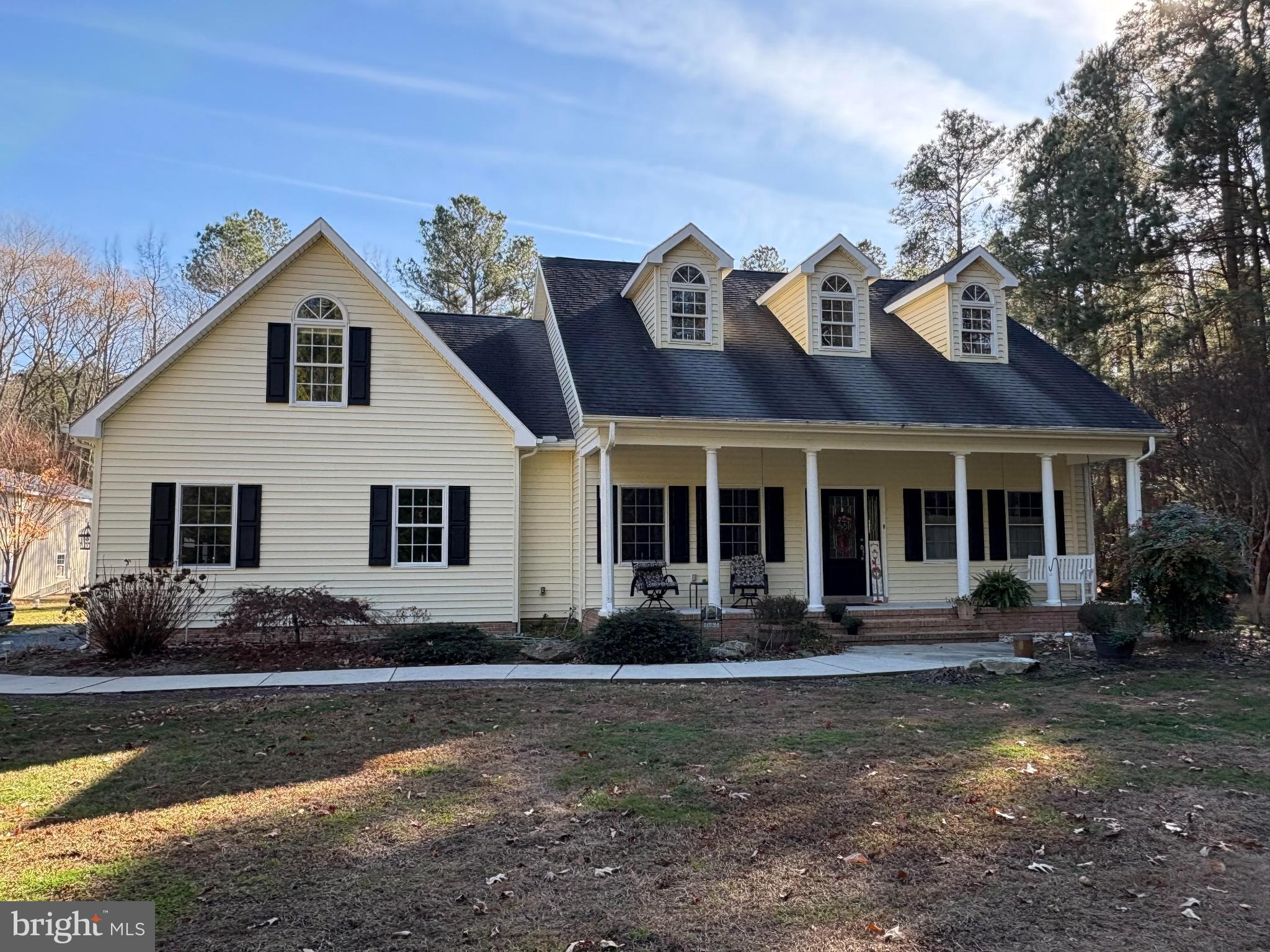 7395 Cherry Walk Road Hebron, MD 21830 - Photo 2 of 61 a front view of a house with yard