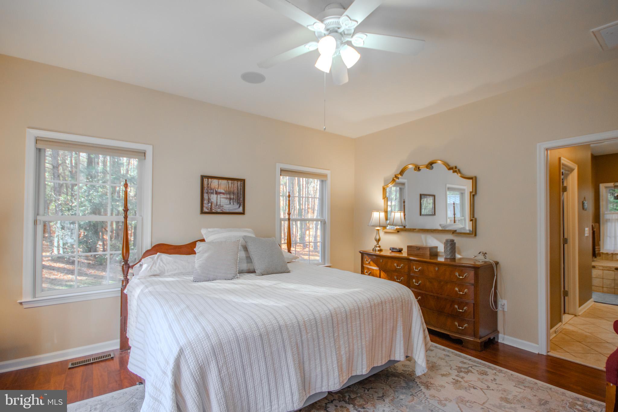 7395 Cherry Walk Road Hebron, MD 21830 - Photo 25 of 61 Serene bedroom with nature views.