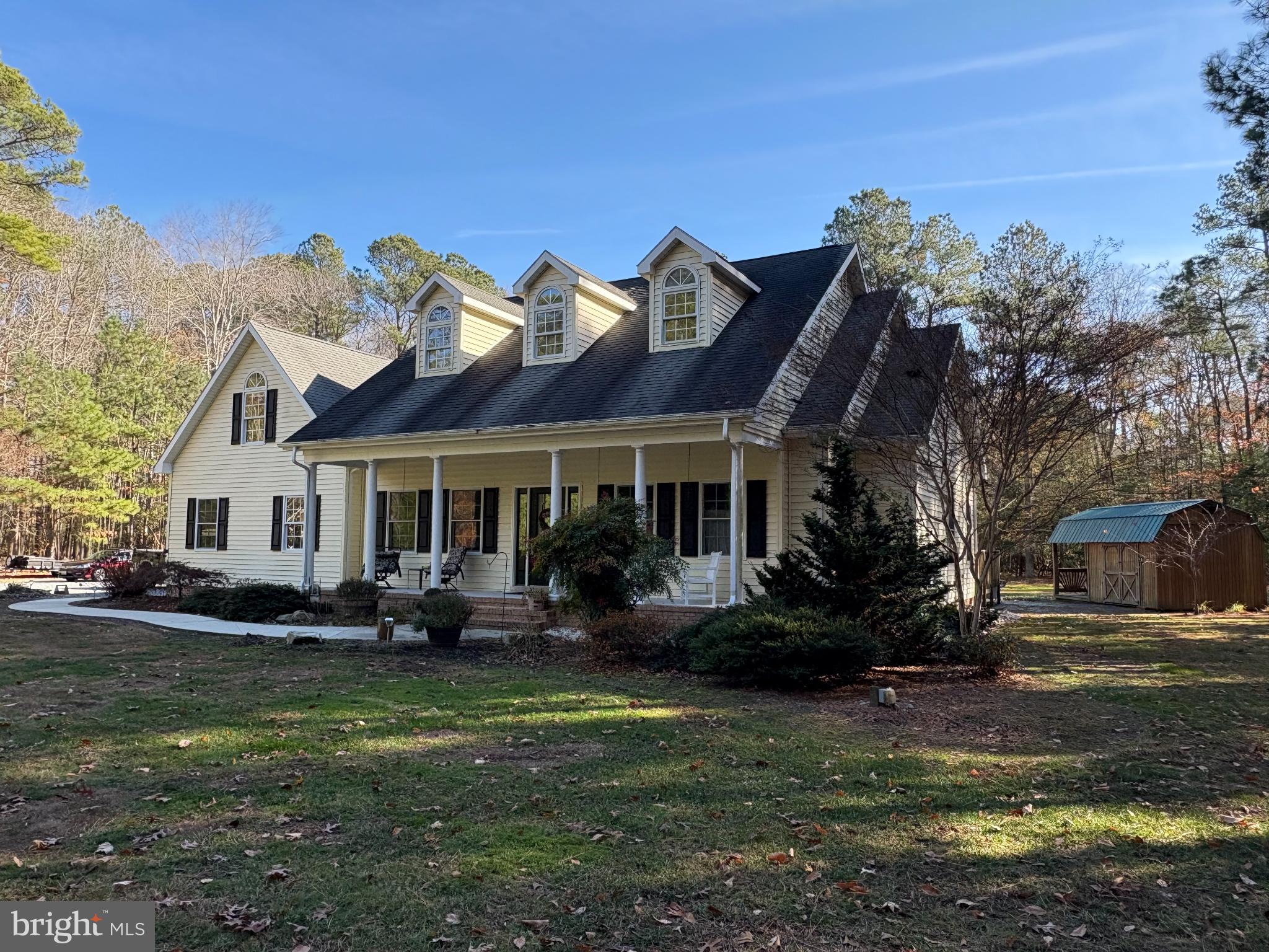 7395 Cherry Walk Road Hebron, MD 21830 - Photo 3 of 61 a front view of house with yard and green space