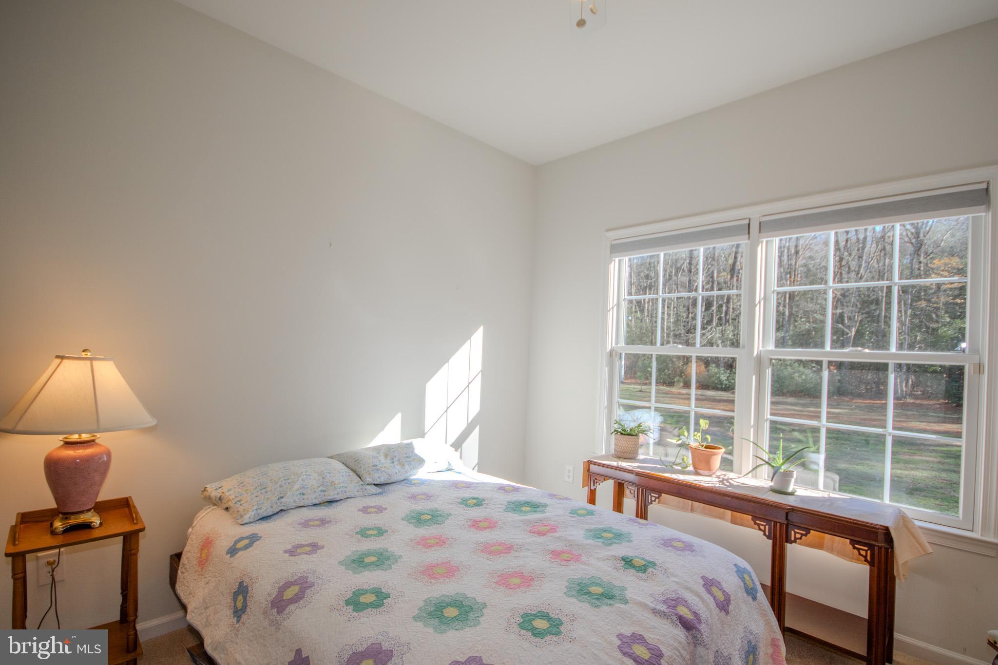 7395 Cherry Walk Road Hebron, MD 21830 - Photo 36 of 61 a bedroom with a bed and a window