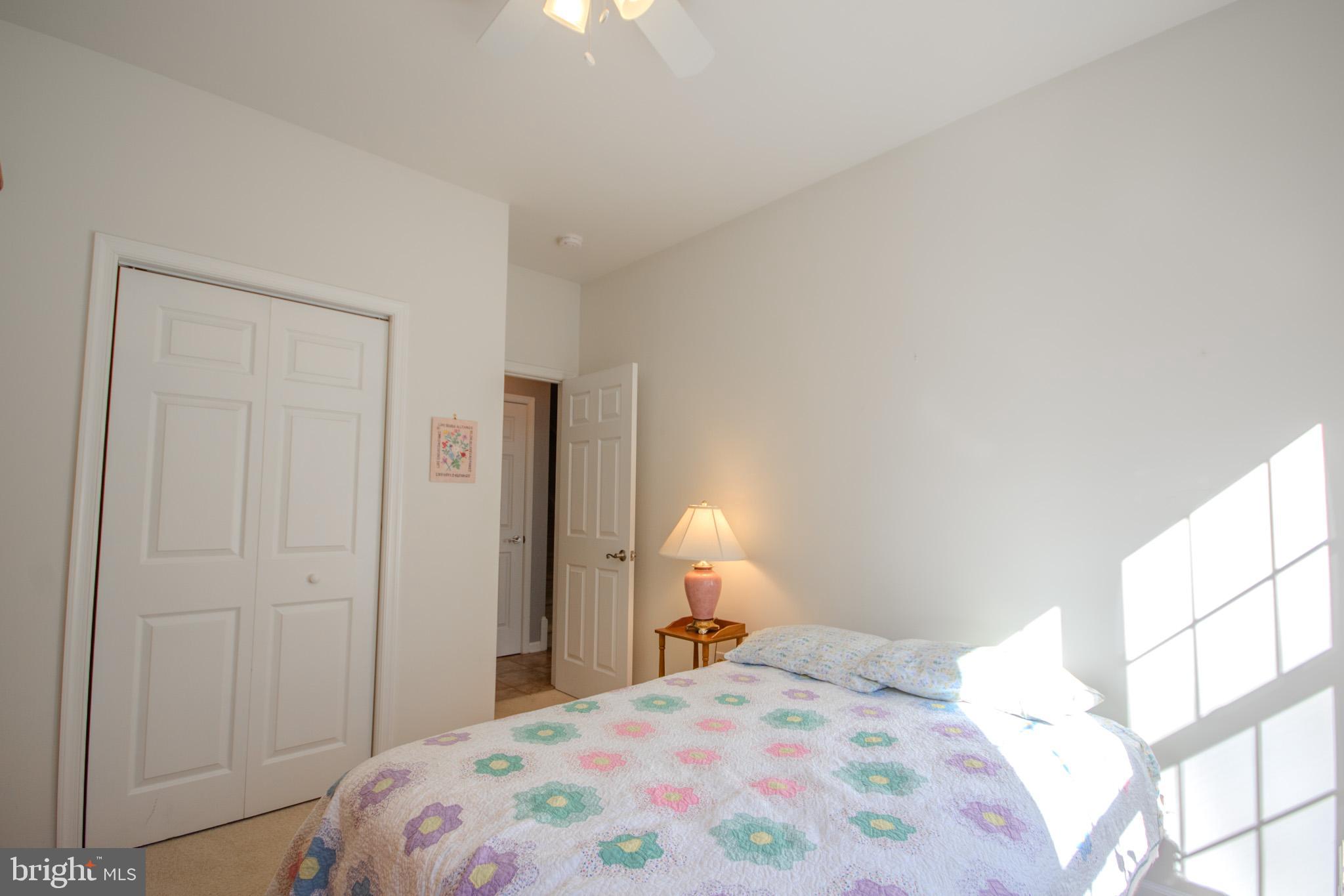 7395 Cherry Walk Road Hebron, MD 21830 - Photo 37 of 61 a bedroom with a bed and a window