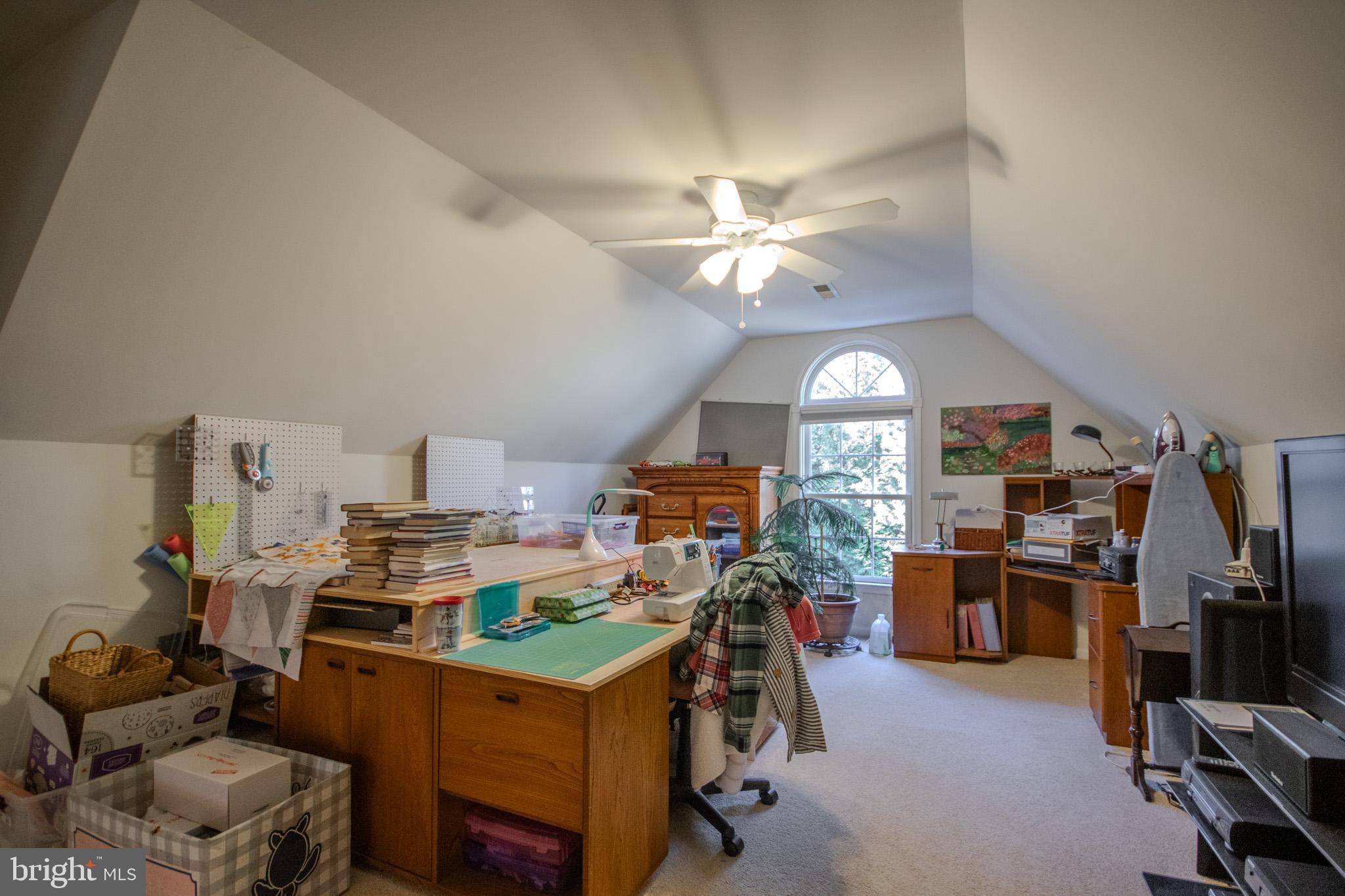 7395 Cherry Walk Road Hebron, MD 21830 - Photo 38 of 61 a view of a workspace with furniture and a gym equipment
