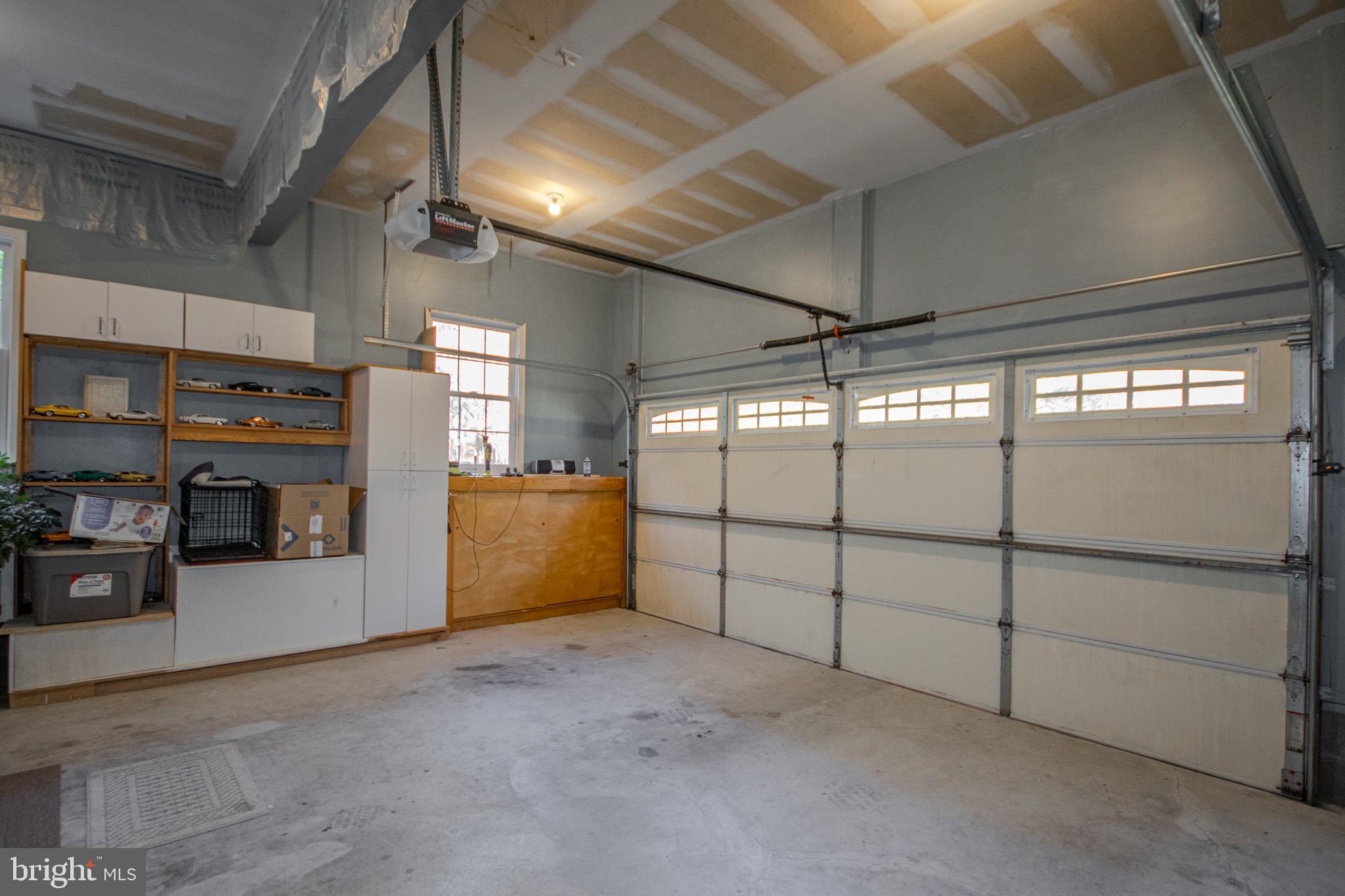 7395 Cherry Walk Road Hebron, MD 21830 - Photo 46 of 61 Spacious garage with ample storage options.
