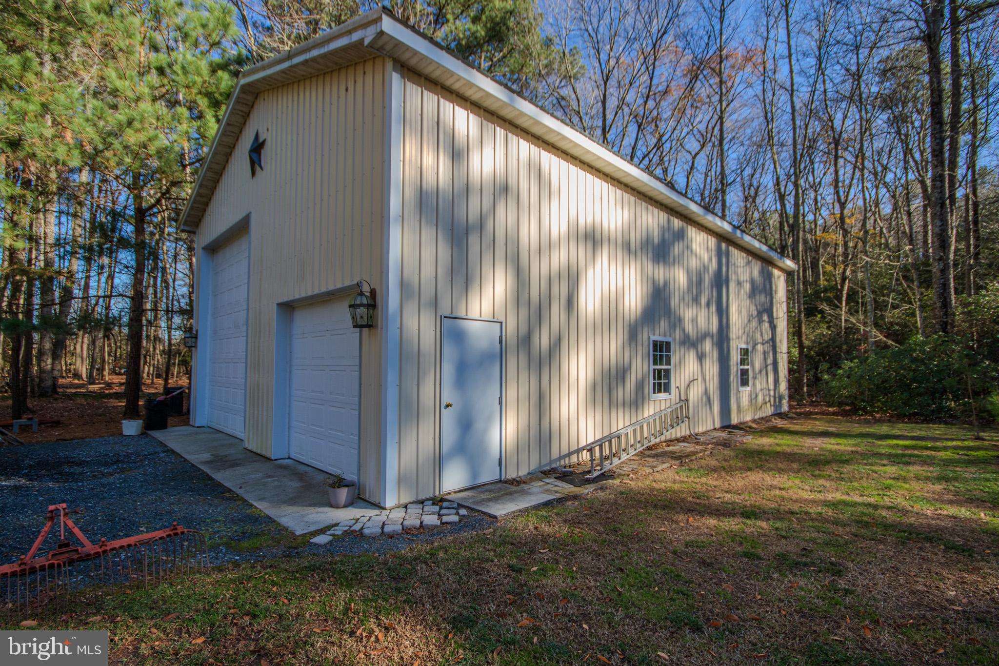 7395 Cherry Walk Road Hebron, MD 21830 - Photo 48 of 61 a backyard of a house with lots of green space