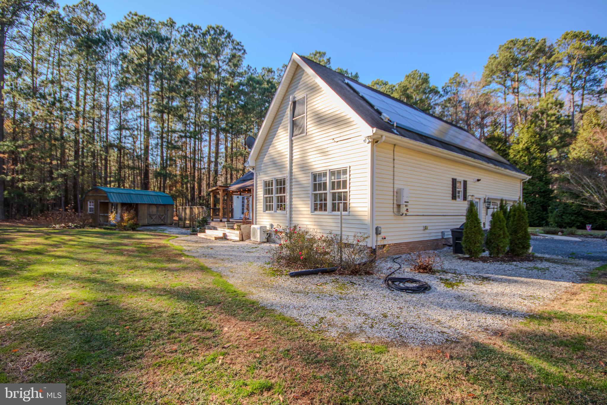 7395 Cherry Walk Road Hebron, MD 21830 - Photo 52 of 61 a view of a house with backyard and sitting area