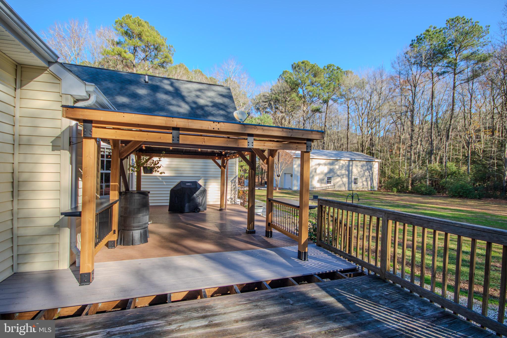 7395 Cherry Walk Road Hebron, MD 21830 - Photo 55 of 61 Charming deck with serene woodland views.