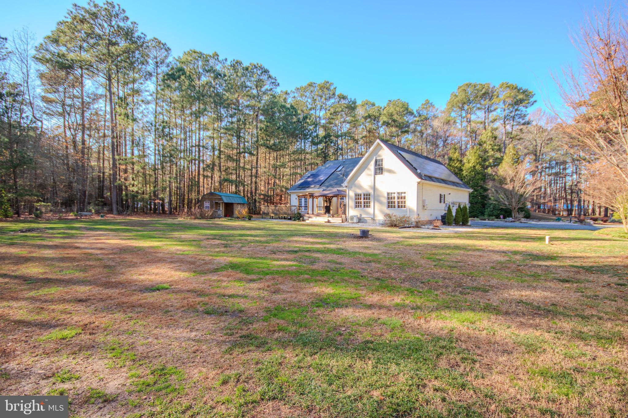 7395 Cherry Walk Road Hebron, MD 21830 - Photo 58 of 61 a view of house with garden space and trees in the background