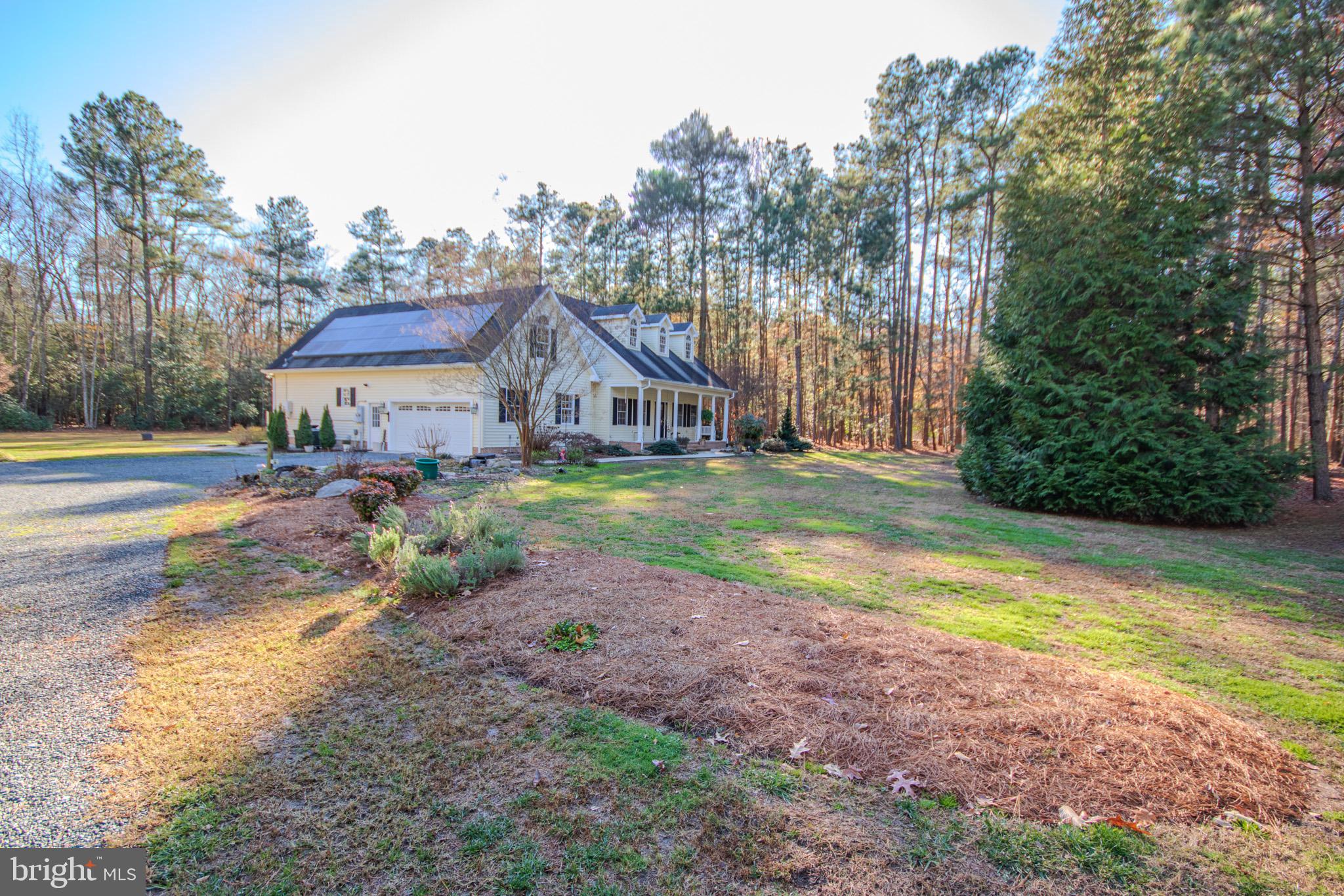 7395 Cherry Walk Road Hebron, MD 21830 - Photo 60 of 61 a view of a house with a yard and sitting area