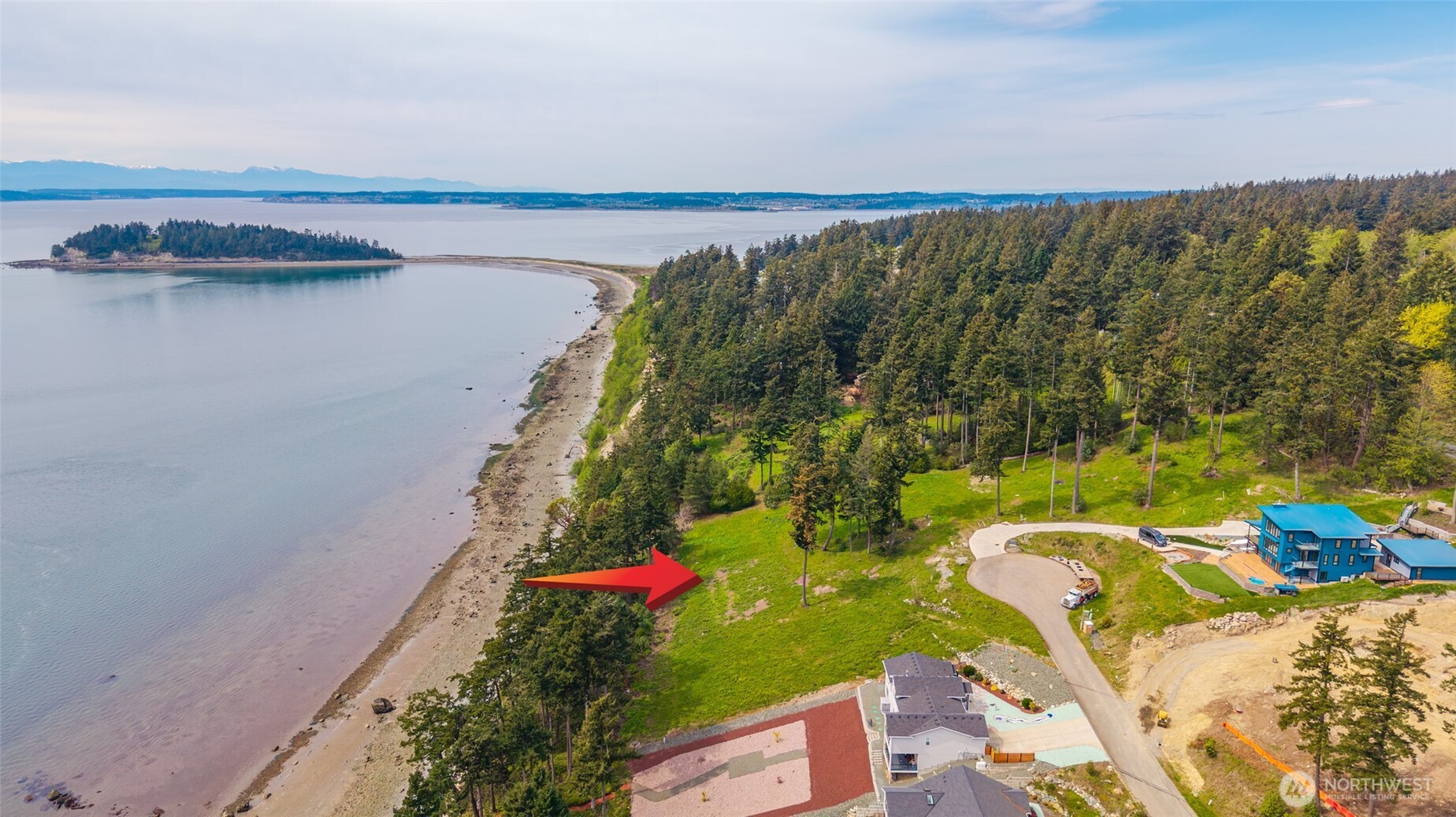 1418 Sergios View Lane Oak Harbor, WA 98277 - Photo 4 of 13 a view of a lake with a mountain
