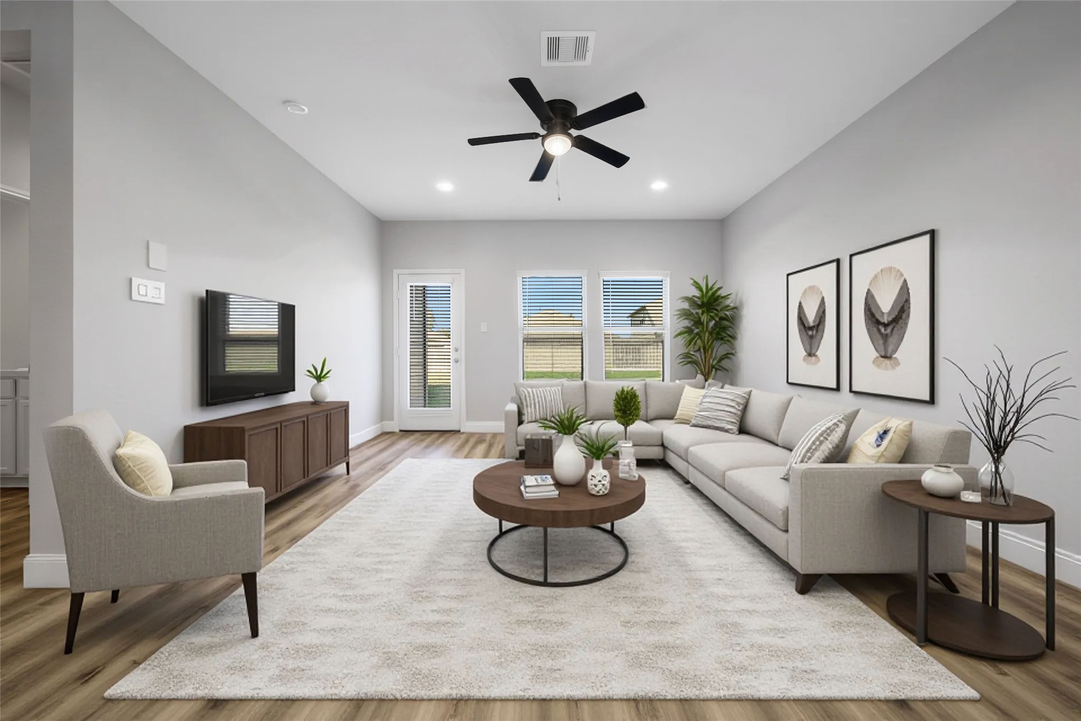 2415 Sutton Hollow Court Spring, TX 77373 - Photo 12 of 40 a living room with furniture and a flat screen tv