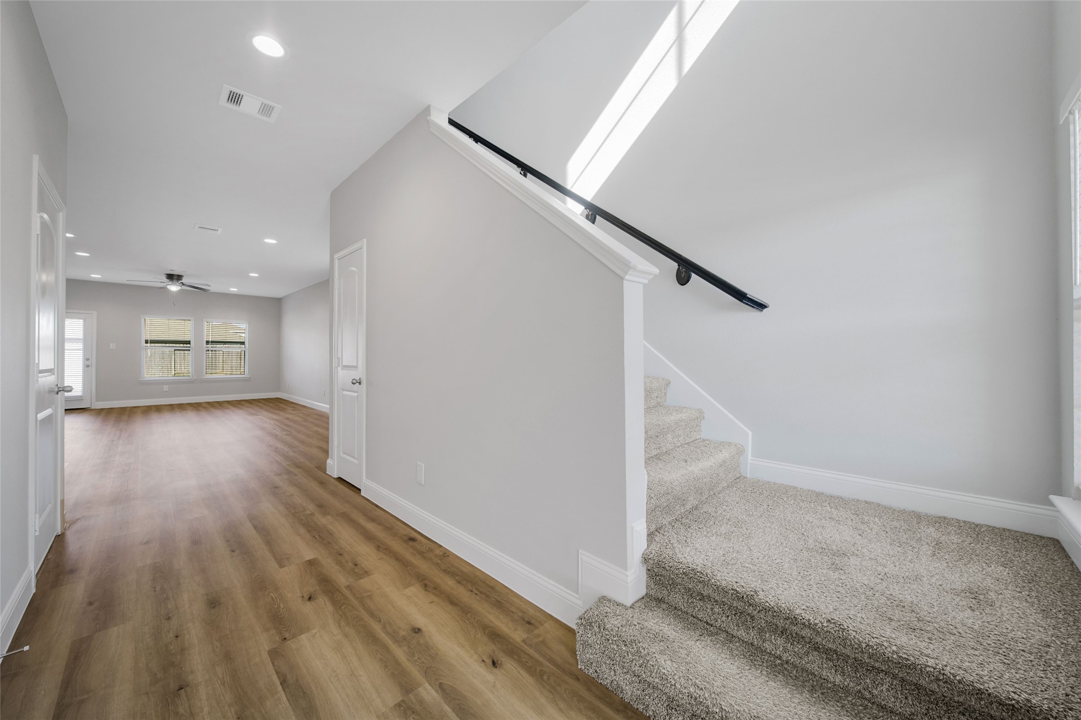 2415 Sutton Hollow Court Spring, TX 77373 - Photo 18 of 40 a view of entryway with wooden floor