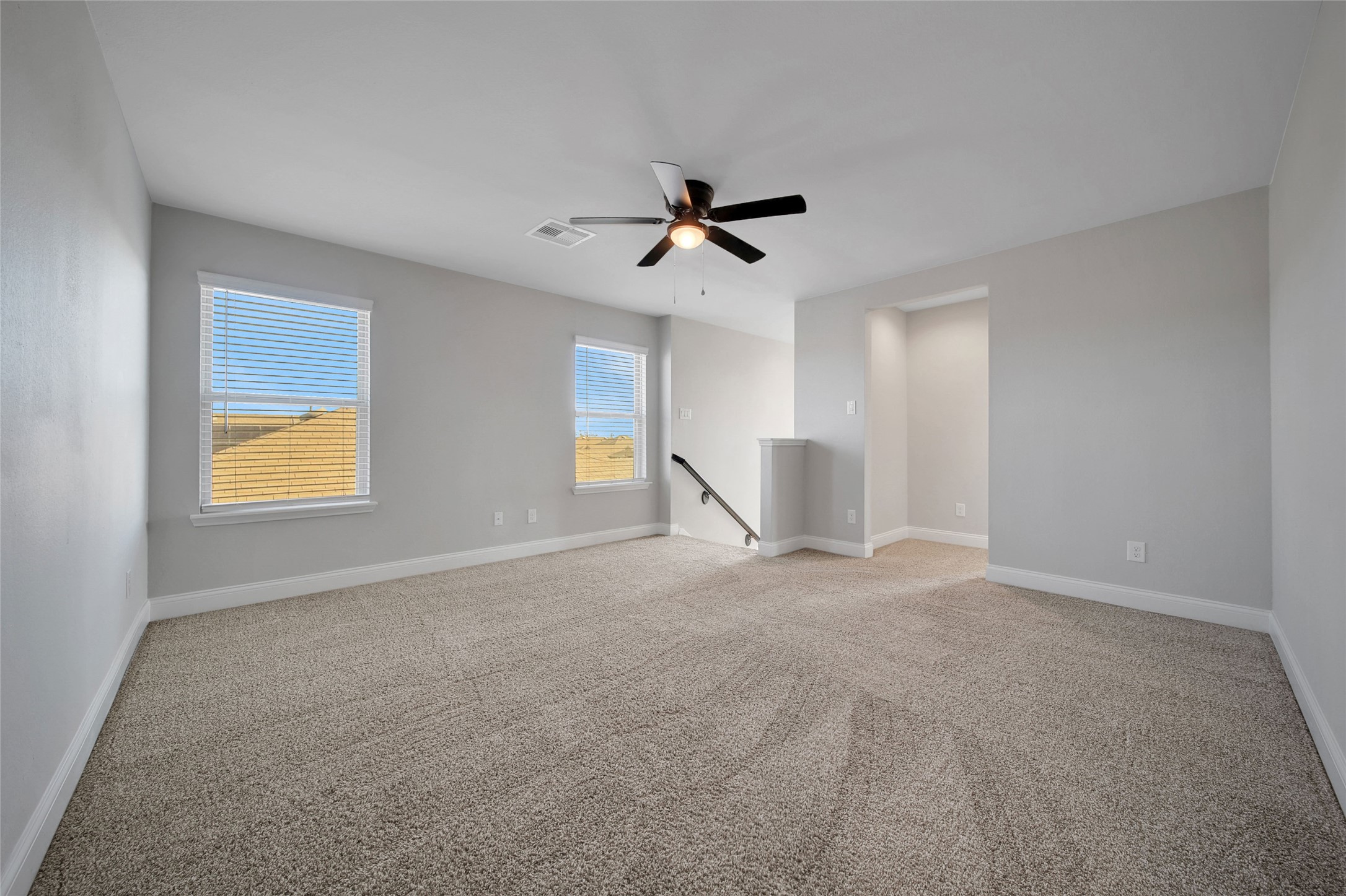 2415 Sutton Hollow Court Spring, TX 77373 - Photo 20 of 40 a view of a livingroom with a ceiling fan and window