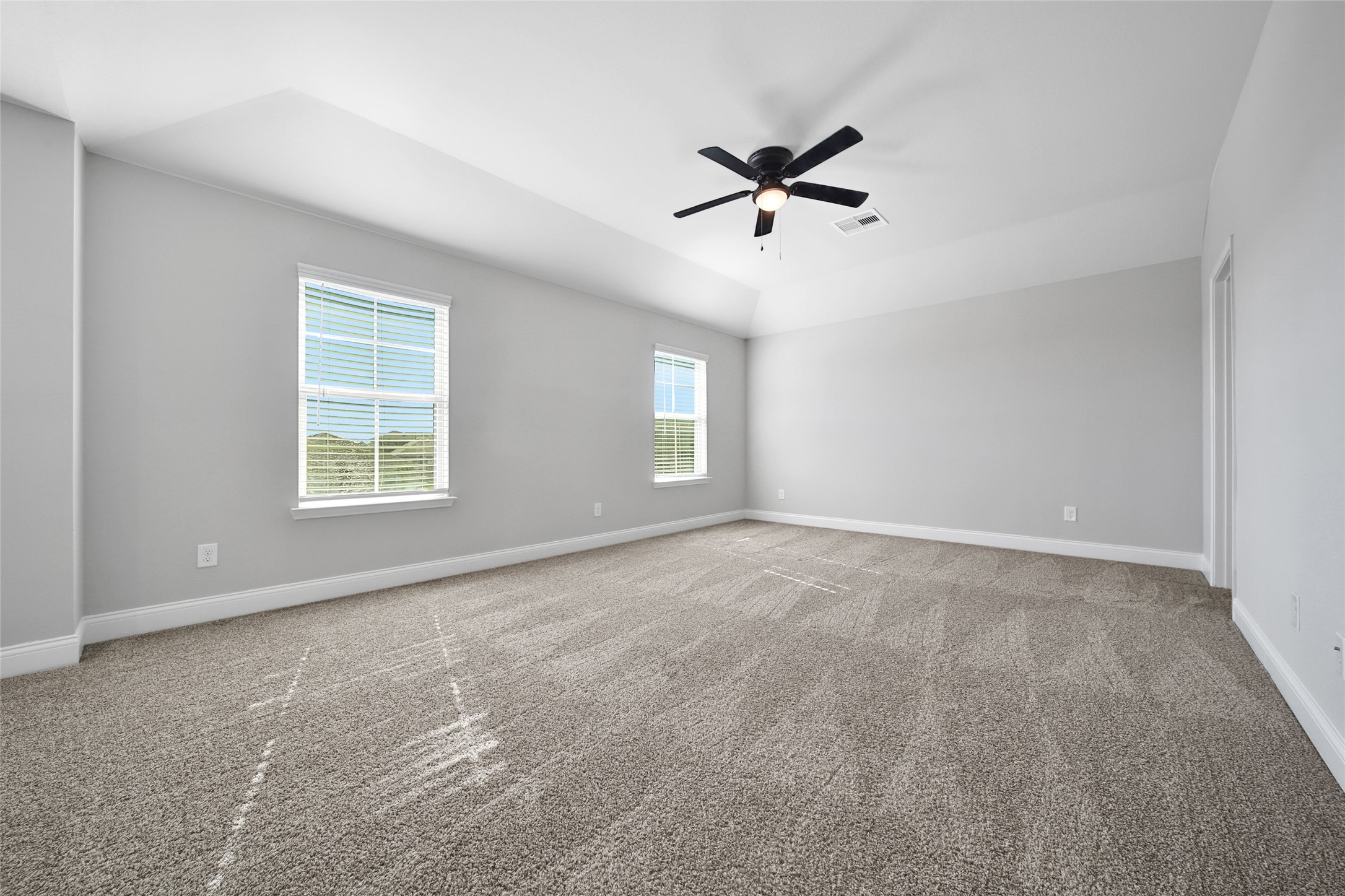 2415 Sutton Hollow Court Spring, TX 77373 - Photo 23 of 40 a view of empty room with windows