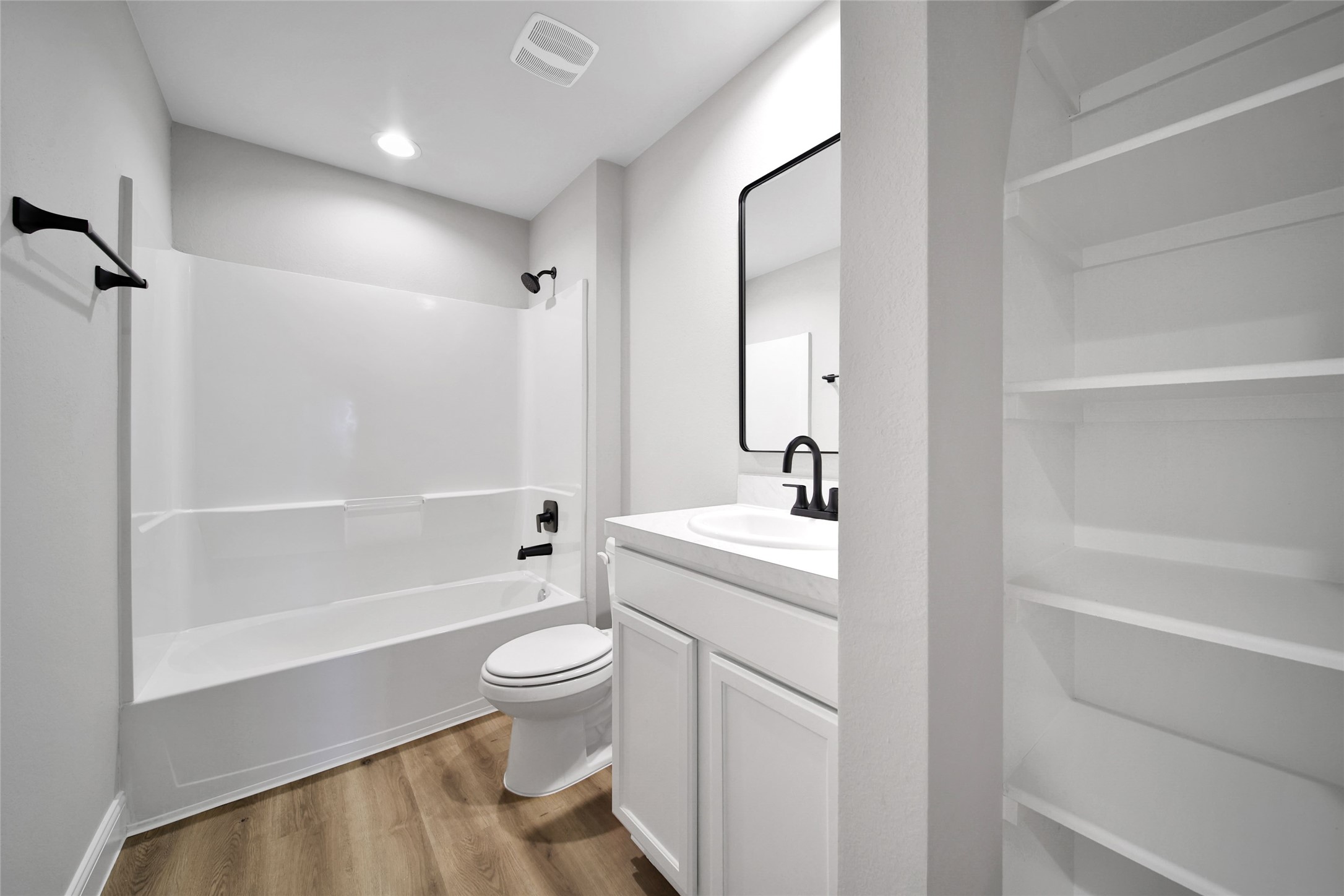 2415 Sutton Hollow Court Spring, TX 77373 - Photo 30 of 40 a bathroom with a sink toilet and shower