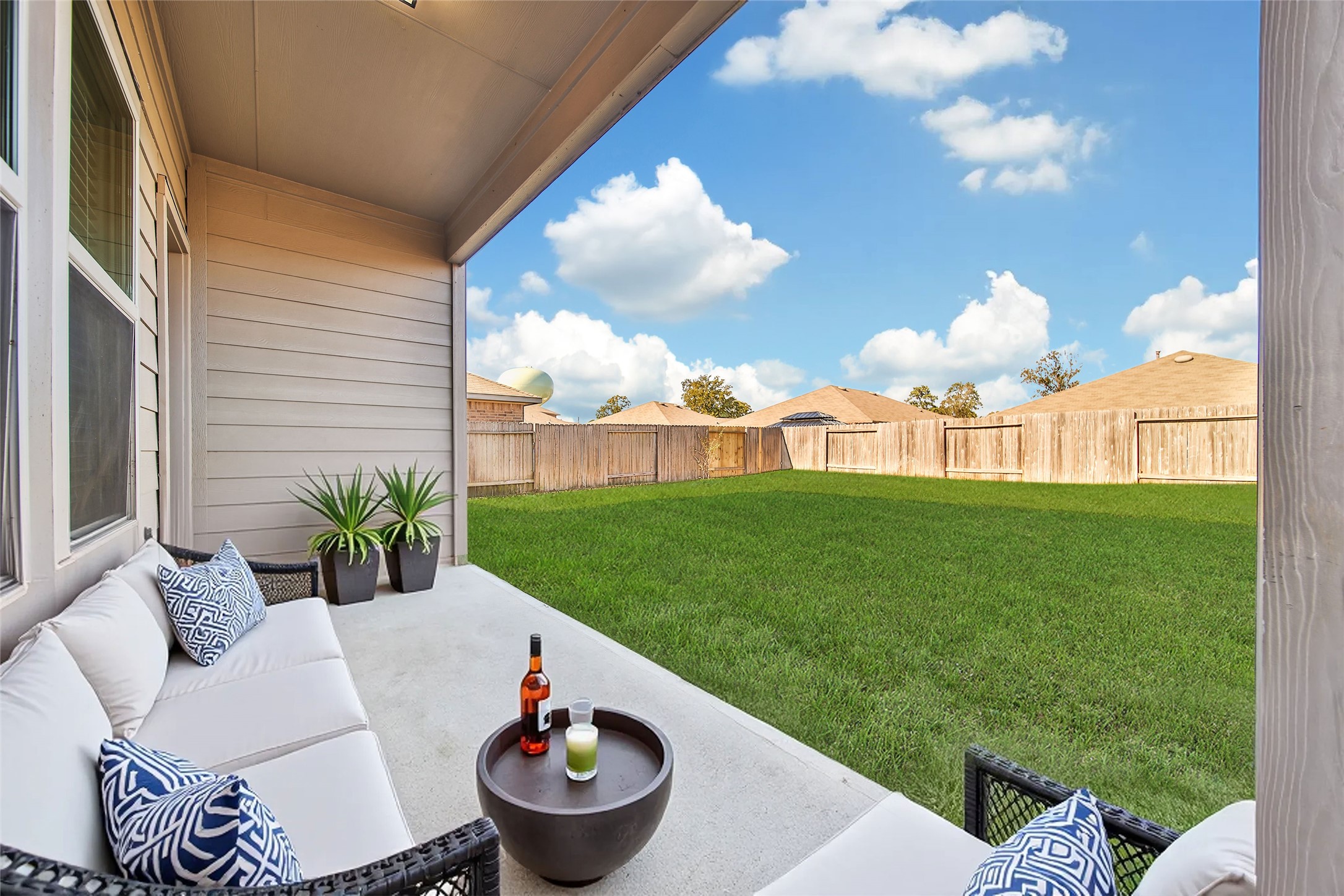 2415 Sutton Hollow Court Spring, TX 77373 - Photo 36 of 40 a view of a backyard with plants and patio