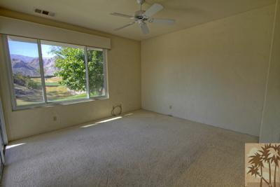 56565 Riviera La Quinta, CA 92253 - Photo 14 of 25 an empty room with a window