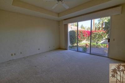 56565 Riviera La Quinta, CA 92253 - Photo 23 of 25 a view of empty room with floor to ceiling window and floor to ceiling window