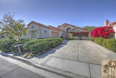 56565 Riviera La Quinta, CA 92253 - Photo 25 of 25 a front view of a house with a yard