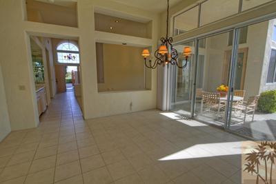 56565 Riviera La Quinta, CA 92253 - Photo 7 of 25 a view of a empty room with a glass door and furniture