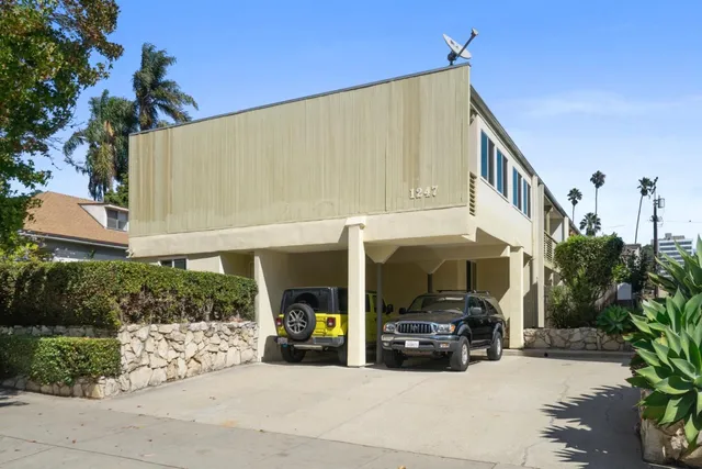 a view of a building with sitting area